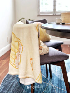 Siu Mai Blanket on a chair